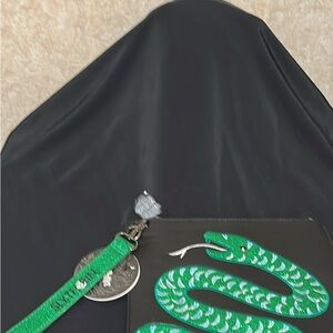 Danielle Nicole Black Wristlet with Green Slytherin Snake Detail